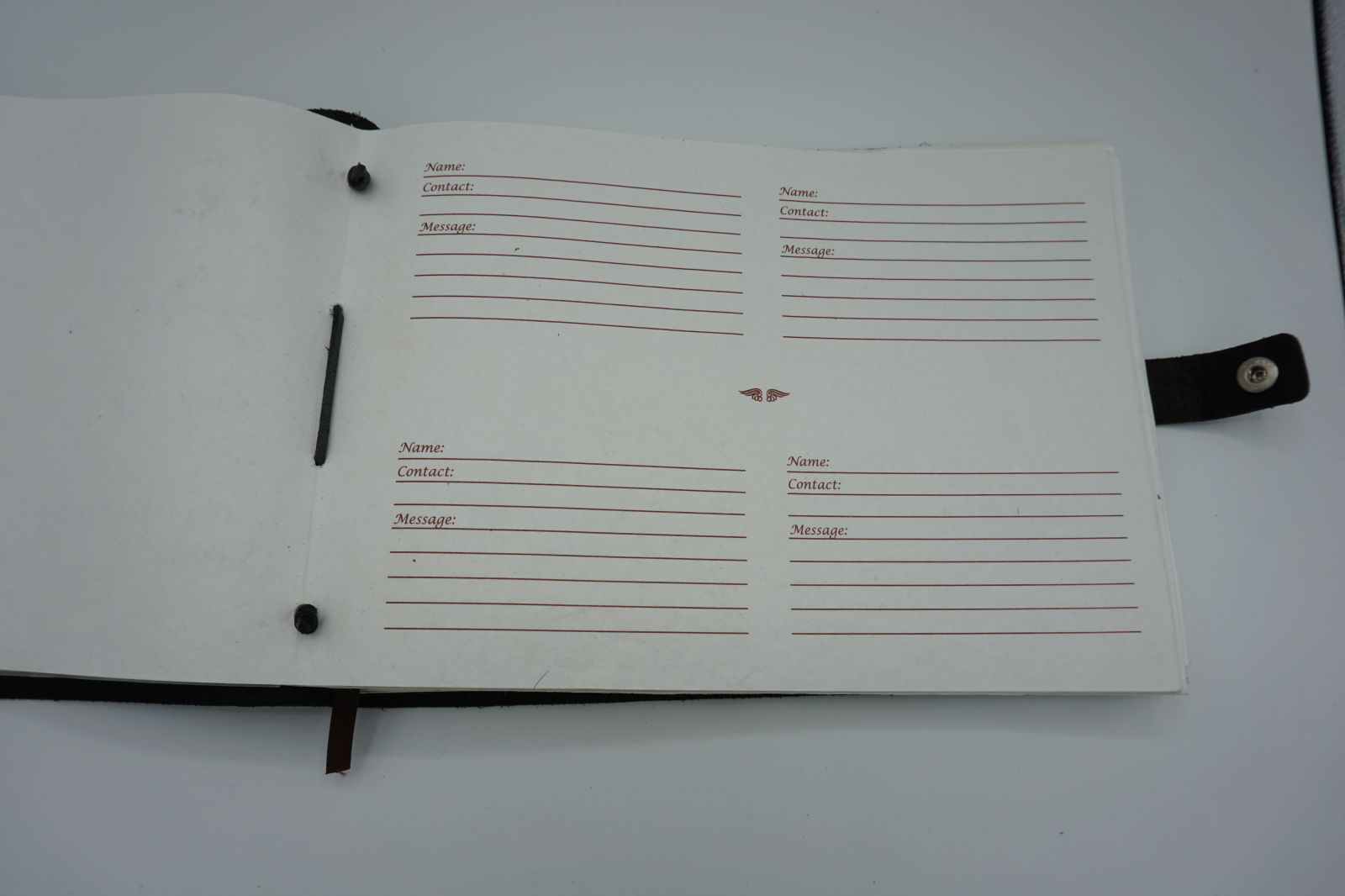 Premium book open to album pages